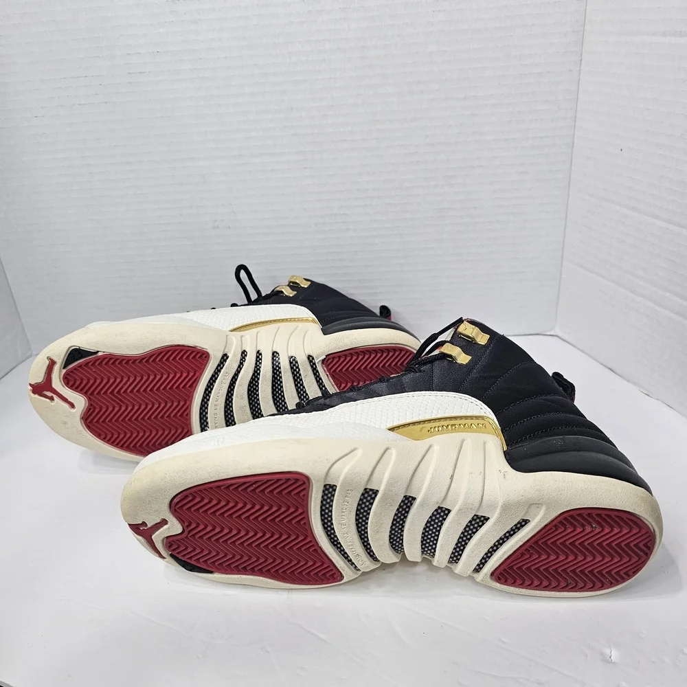 Jordan Black and White Sneakers with Gold Accents
